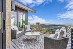 Balcony featuring an outdoor hangout area