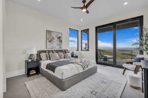 Bedroom with access to exterior, light colored carpet, a ceiling fan, and recessed lighting