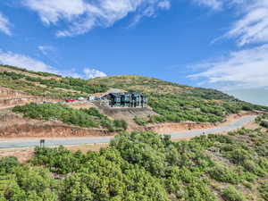 View from above of property with a mountainous background