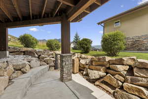 View of patio with a mountain view