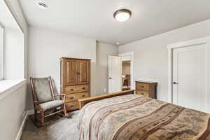 Bedroom featuring carpet floors