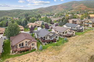Aerial perspective of suburban area featuring mountains