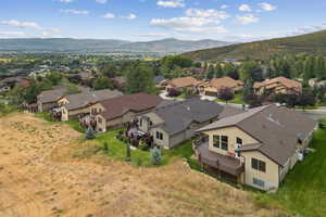 Aerial view of residential area featuring mountains