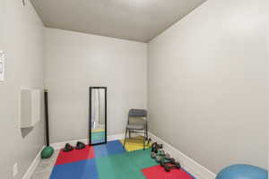 Workout room with baseboards