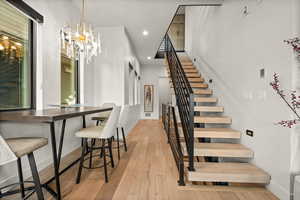 From the great room, this hall leads to the laundry room, a 3/4 bath and a bedroom.
