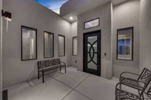 Foyer featuring a textured wall