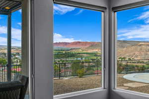 Doorway featuring a mountain view