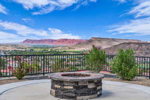 View of patio featuring a mountain view and a fire pit