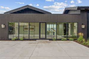 Rear view of property with a patio area