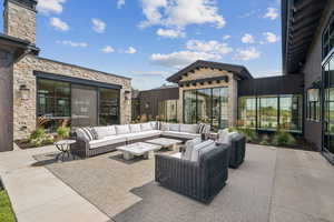 View of patio with an outdoor living space