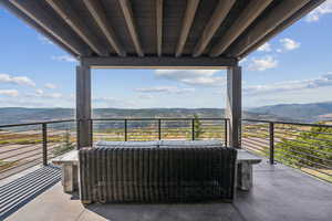 View of patio / terrace with a mountain view and an outdoor hangout area