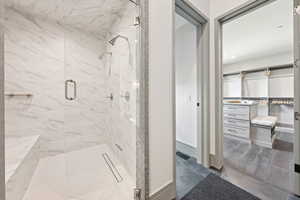 Full bathroom with a stall shower