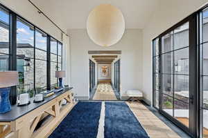 Hall featuring healthy amount of natural light