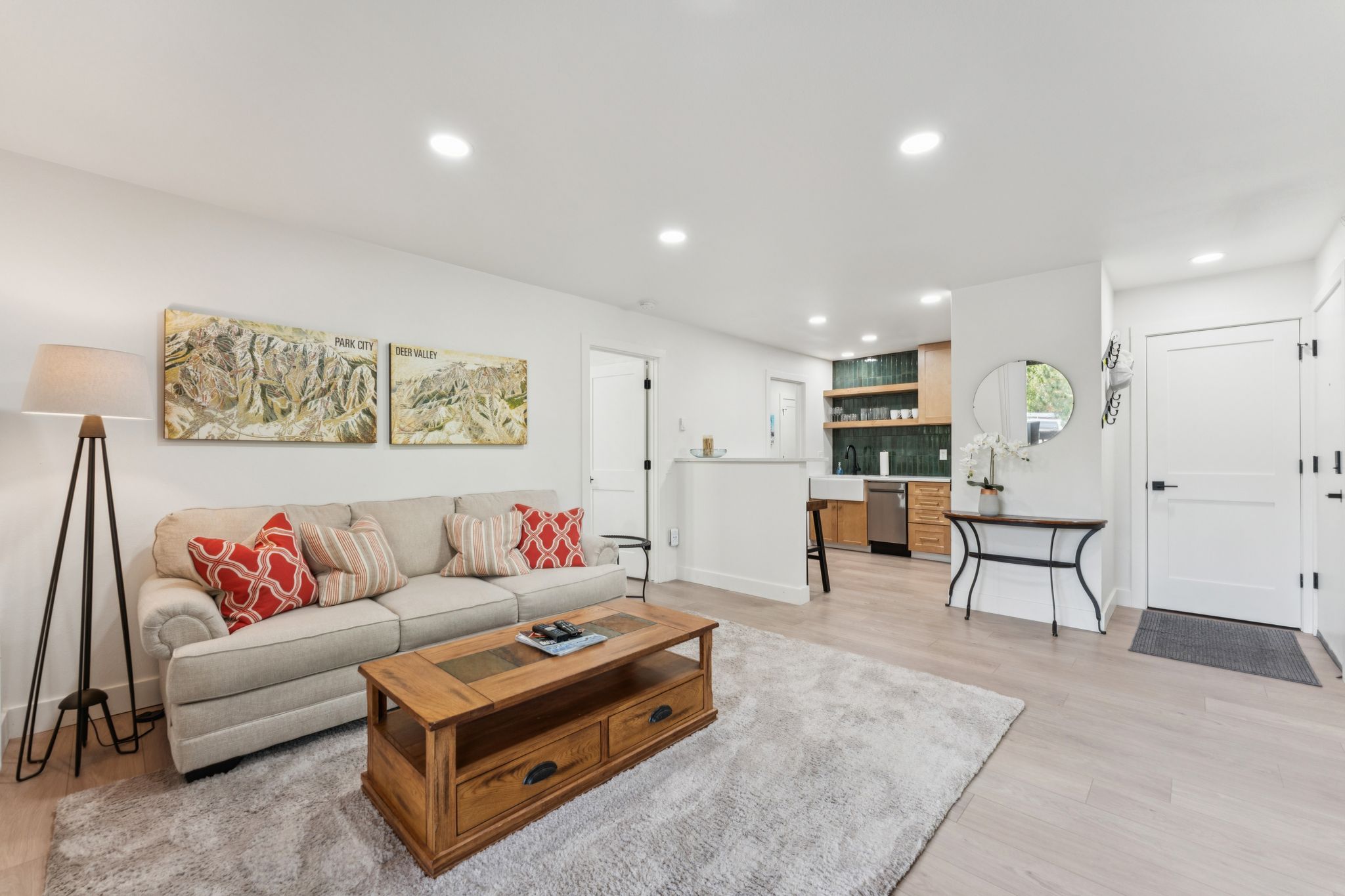 Living area featuring light wood-type flooring and recessed lighting