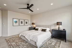 Bedroom with carpet flooring, recessed lighting, and a ceiling fan
