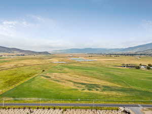 Overview of rural landscape with a mountain backdrop
