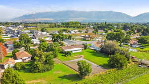 Aerial view of residential area with a mountain backdrop