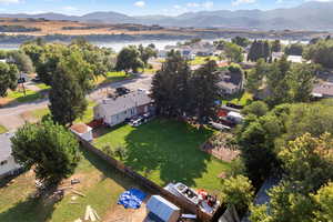 Aerial perspective of suburban area featuring a water and mountain view