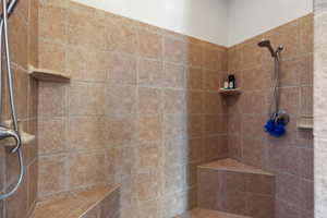 Bathroom with a tile shower