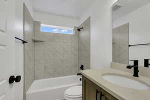 Full bath with shower / washtub combination and vanity