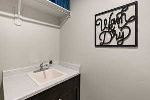 Washroom featuring a sink