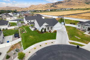 Aerial view of residential area featuring mountains