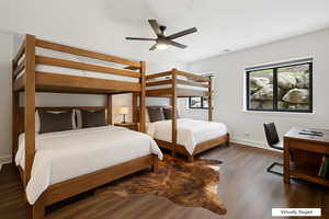 Bedroom with wood finished floors and ceiling fan
