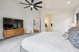 Bedroom featuring carpet flooring, a ceiling fan, recessed lighting, and a high ceiling