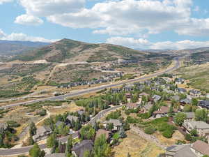 Aerial view of residential area with mountains