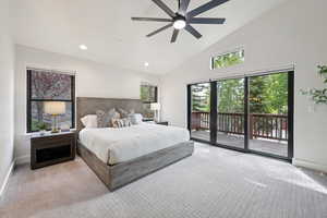 Carpeted bedroom featuring high vaulted ceiling, access to exterior, recessed lighting, and a ceiling fan