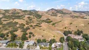 Aerial overview of property's location with a mountain backdrop
