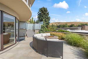 View of patio / terrace featuring an outdoor living space with a fire pit