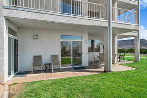 Patio / terrace featuring a patio area and a lawn
