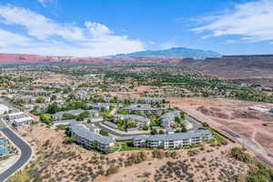 Drone / aerial view of a mountainous background and a desert landscape