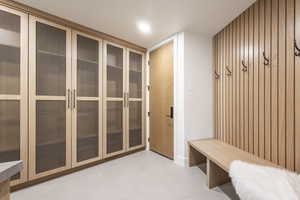 Mudroom featuring light floors