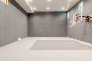 View of sports court with basketball hoop