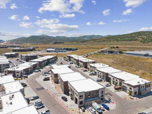 Drone / aerial view of industrial structures and mountains