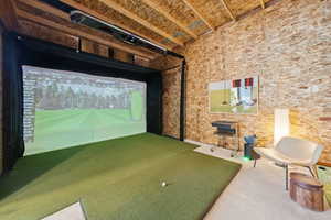 Rec room with golf simulator