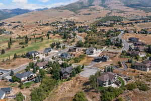 View of property location with nearby suburban area and mountains