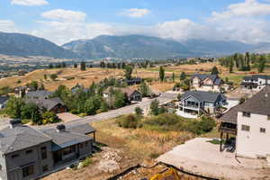 Aerial view of residential area with a mountainous background