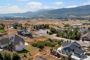 Aerial perspective of suburban area with mountains