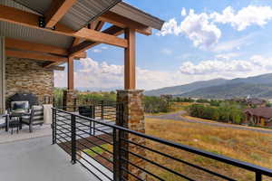 Balcony featuring a mountain view