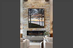 Living area with a stone fireplace