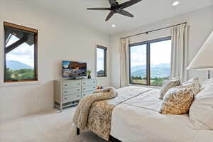 Carpeted bedroom featuring recessed lighting and ceiling fan
