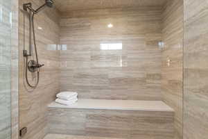 Full bathroom with a tile shower