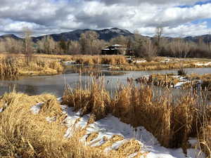 Water view with a mountainous background