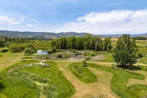 View of rural area with a water and mountain view