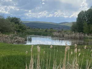 Water view with a mountainous background