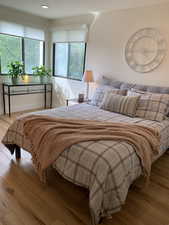 Bedroom featuring light wood-type flooring and recessed lighting