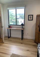 Home office featuring light wood finished floors